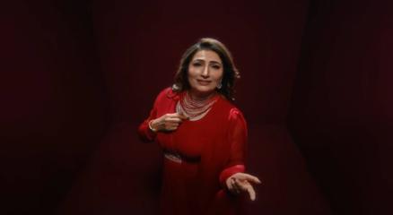 Poster-style artwork for Pakistani song “Mastani” with stage lights, red fabric and musical symbols, no people visible